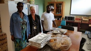 Nurse Lynette, Lorry Herdeen (Executive Director), and Volunteer